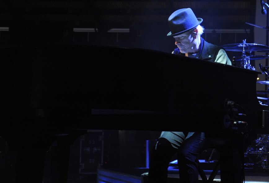 Neal Doughty, REO Speedwagon keyboardist, plays the piano during a performance at the Spokane Interstate Fair in Spokane, Washington, Sept. 11, 2014. REO Speedwagon thanked America’s veterans and families, both past and present, for their service and sacrifice in the name of freedom. Total force Airmen from around the globe took time to commemorate the 13th anniversary of Sept. 11, 2001, with everything from commemorative runs, to tributes and moments of silence. (U.S. Air Force photo/Staff Sgt. Samantha Krolikowski)