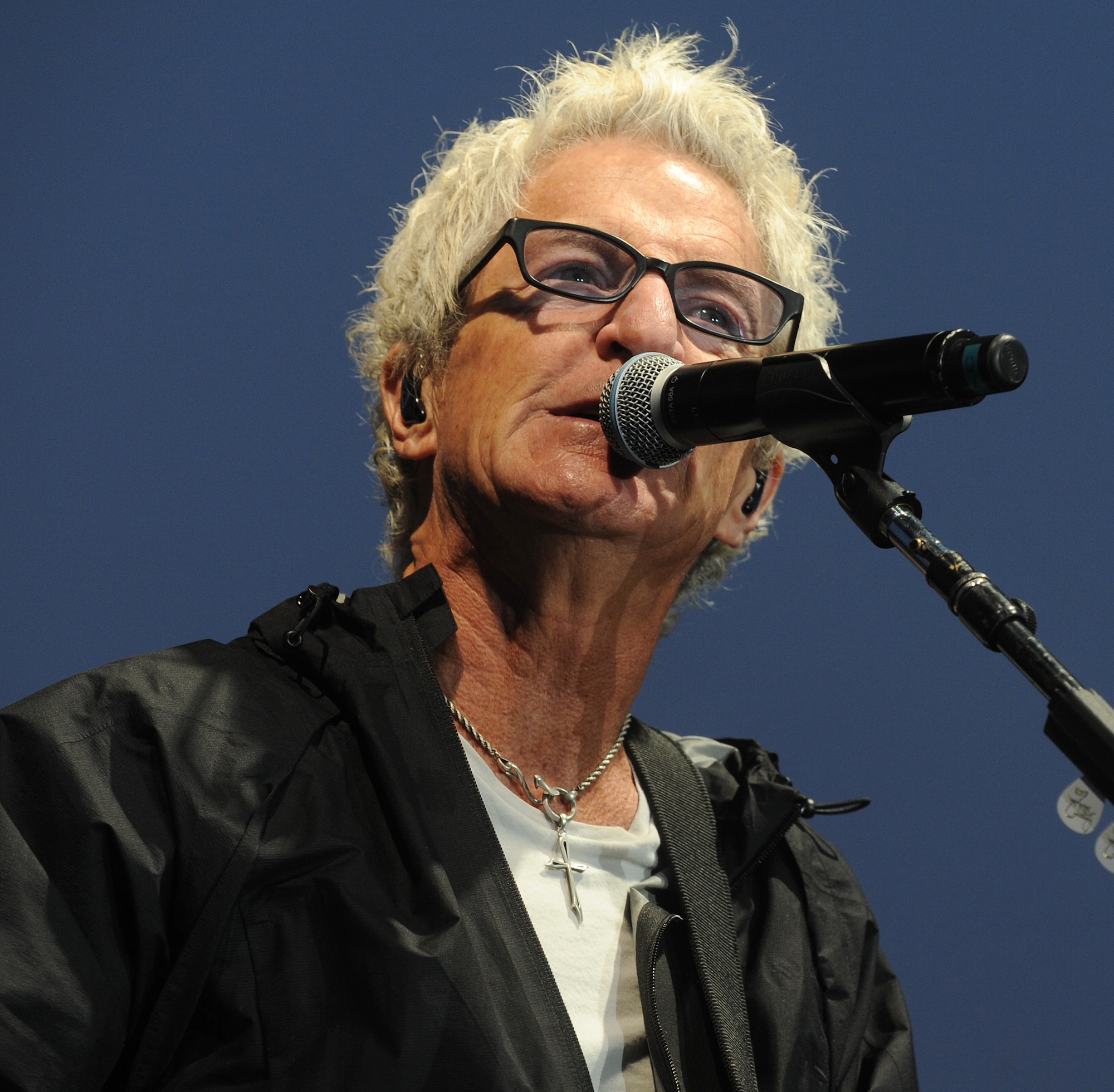 Kevin Cronin, the REO Speedwagon lead vocalist and rhythm guitarist, sings during a performance for an audience primarily made up of America’s veterans and the Spokane community at the Spokane Interstate Fair in Spokane, Washington, Sept. 11, 2014. REO Speedwagon has played on a number of military bases over the years and performances like these allow them to give back to those who have given so much. (U.S. Air Force photo by Staff Sgt. Samantha Krolikowski/Released)