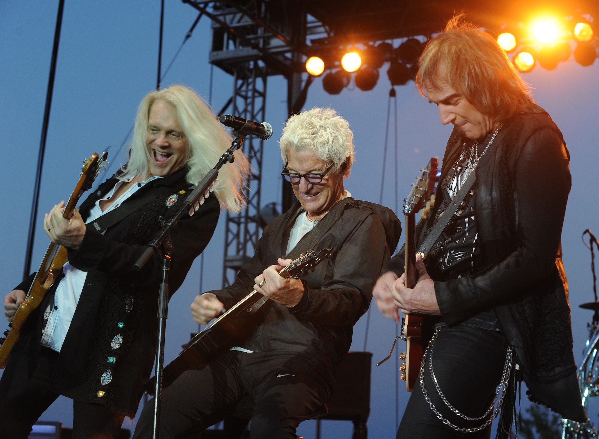 REO Speedwagon performs to an audience primarily made up of America’s veterans during a Grandstand performance at the Spokane Interstate Fair in Spokane, Washington, Sept. 11, 2014. During their performance, Cronin took a moment to thank all past and present American veterans and their families for their service and sacrifice in the name of freedom. (U.S. Air Force photo by Staff Sgt. Samantha Krolikowski/Released)