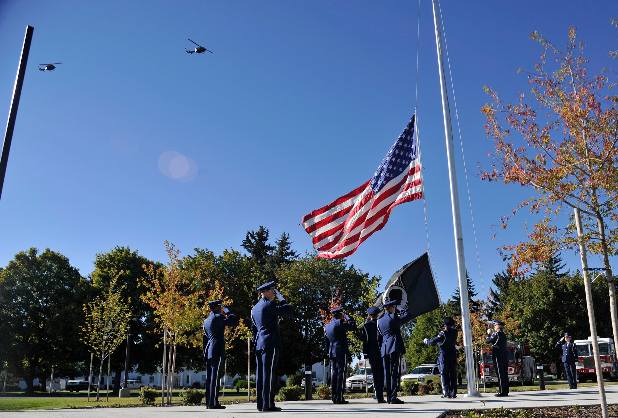 Members of Team Fairchild’s base Honor Guard perform during a Sept. 11 retreat ceremony at Fairchild Air Force Base, Washington, Sept. 11, 2014. The base honor guard presented a memorial wreath and wing officials spoke about the attacks on Sept. 11, 2001 before the installation flag was lowered and folded for the night. (U.S. Air Force photo by Senior Airman Ryan Zeski/Released)