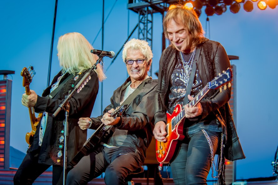 Kevin Cronin, Dave Amato and Bruce Hall, REO Speedwagon musicians, entertain the Spokane community including America's veterans during a Grandstand performance at the Spokane Interstate Fair in Spokane, Washington, Sept. 11, 2014. REO Speedwagon thanked America’s veterans and families, both past and present, for their service and sacrifice in the name of freedom. Total force Airmen from around the globe took time to commemorate the 13th anniversary of Sept. 11, 2001, with everything from commemorative runs, to tributes and moments of silence. (U.S. Air Force photo/Staff Sgt. Benjamin W. Stratton)
