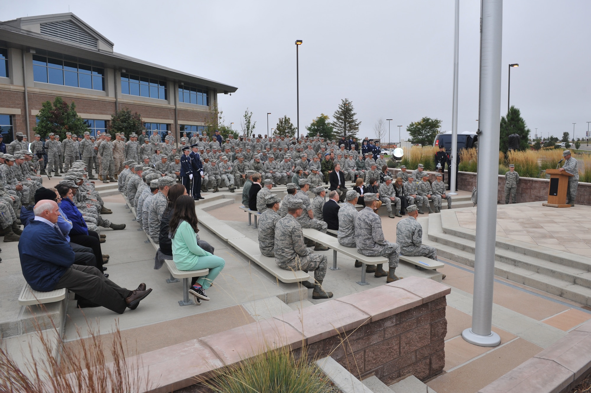 Col. John Wagner, 460th Space Wing commander, speaks during the Patriot Day retreat ceremony Sept. 11, 2014, on Buckley Air Force Base, Colo. Patriot Day is the national day of service and remembrance, in memory of the thousands killed on U.S. soil in the 9/11 attacks. (U.S. Air Force Photo by Airman Emily E. Amyotte/Released)