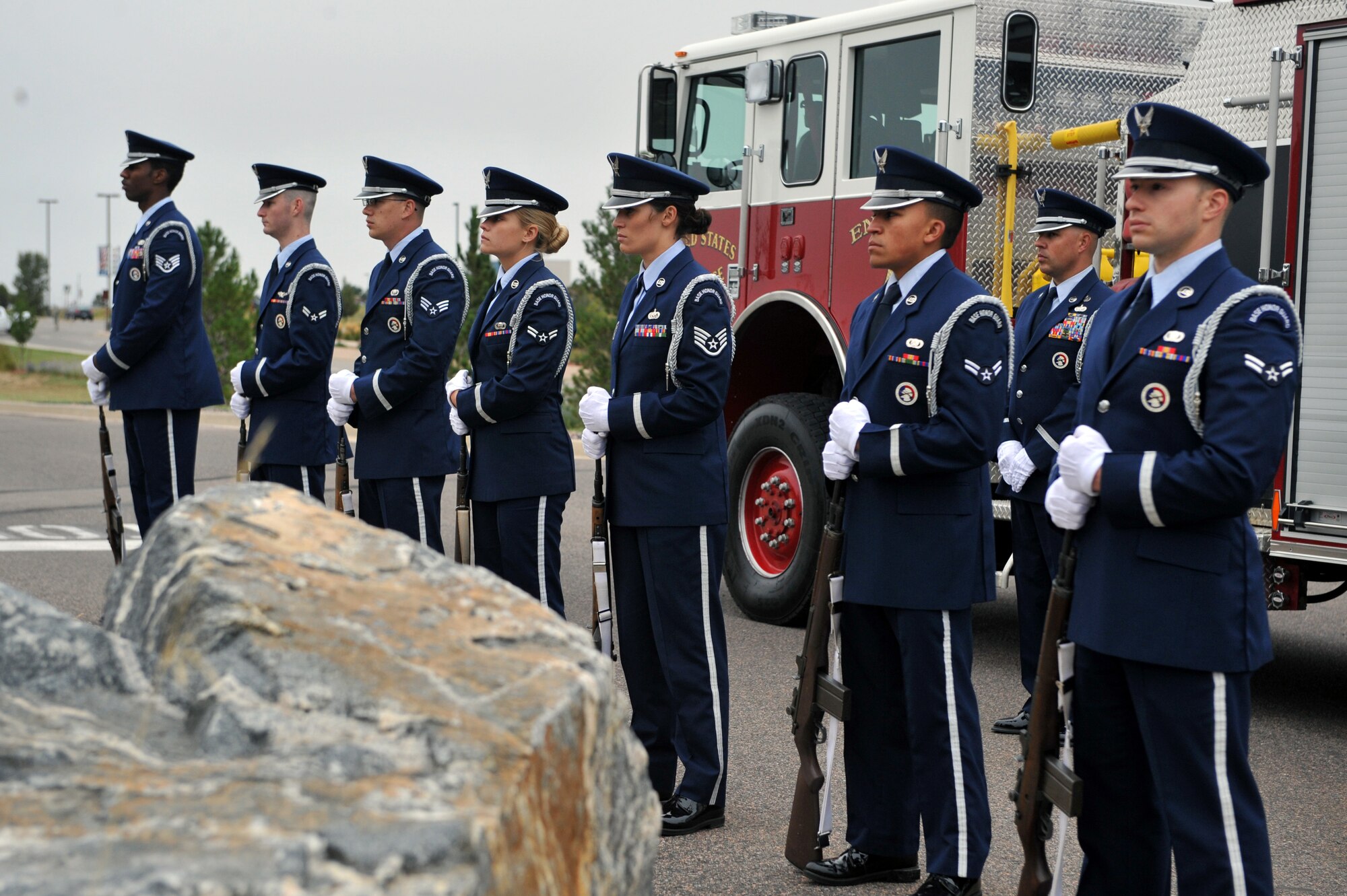 The Mile High Honor Guard stands in honor of the victims and fallen heroes of 9/11 during the Patriot Day retreat ceremony Sept. 11, 2014, on Buckley Air Force Base, Colo. Patriot Day is the national day of service and remembrance, in memory of the thousands killed on U.S. soil in the 9/11 attacks. (U.S. Air Force Photo by Airman Emily E. Amyotte/Released)