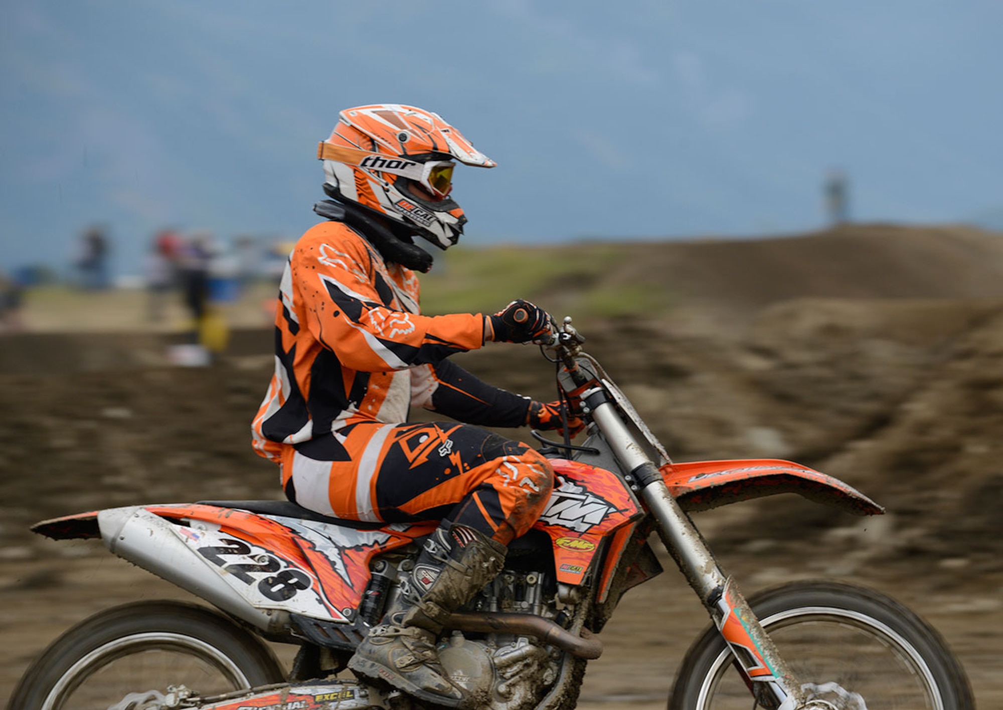 Army Sgt. Jeremy Hazard, 84th Engineer Support Company wheel vehicle mechanic, rides through the track on his dirt bike during the 7th Annual Alaska Supercross Challenge at the Alaska State Fair in Palmer, Alaska, Aug. 23, 2014. Since the age of 7, Hazard has always wanted to feel what the riders were experiencing during the race. (U.S. Air Force photo/Staff Sgt. Sheila deVera)