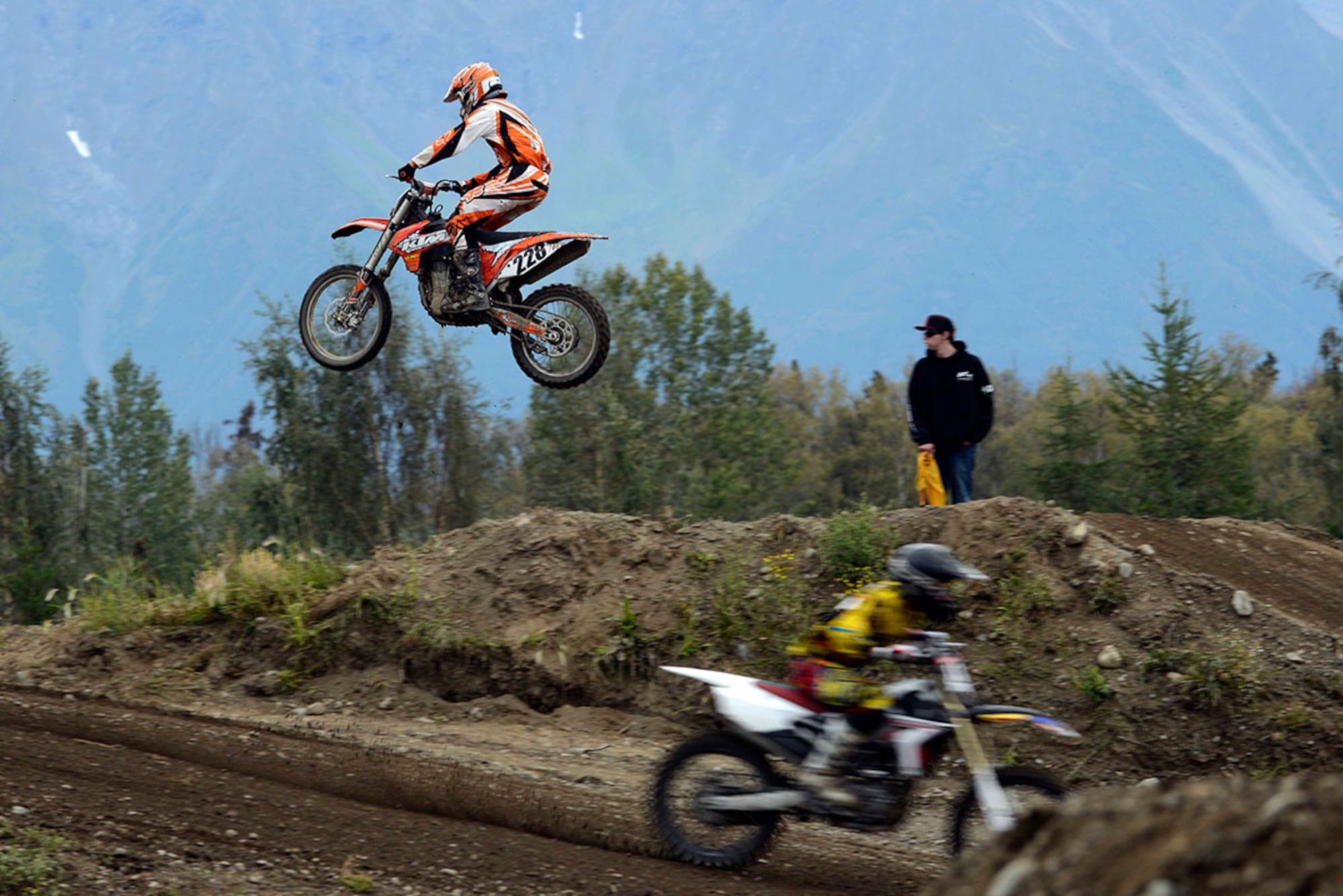Army Sgt. Jeremy Hazard, 84th Engineer Support Company wheel vehicle mechanic, jumps on his dirt bike during the 7th Annual Alaska Supercross Challenge at the Alaska State Fair in Palmer, Alaska, Aug. 23, 2014. This is the first time Hazard participated in the event. (U.S. Air Force photo/Staff Sgt. Sheila deVera)