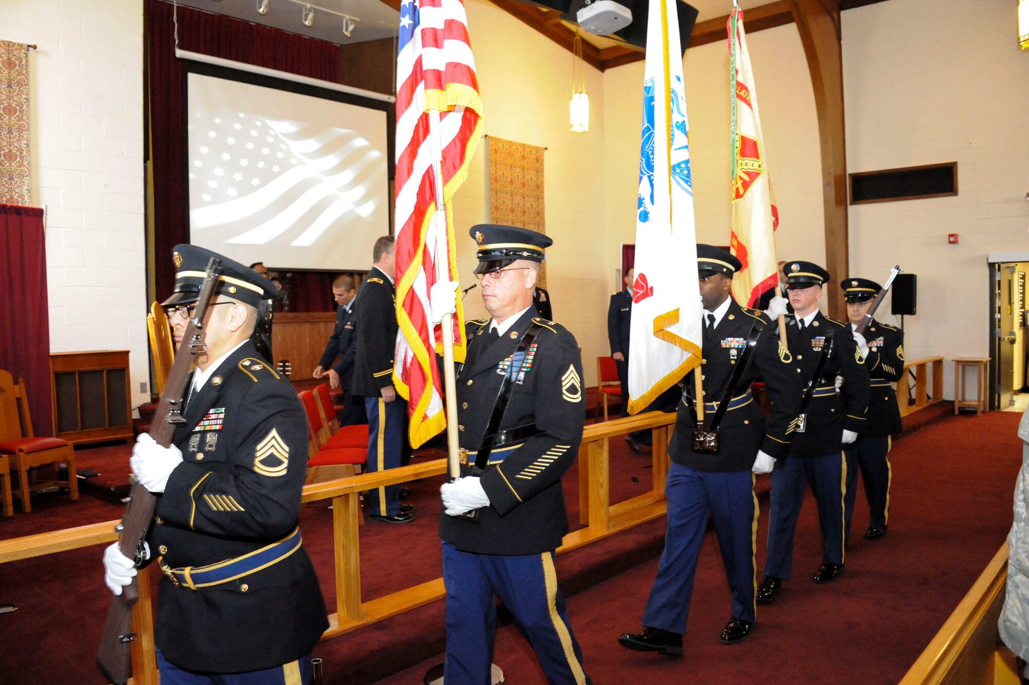 Soldiers from the 99th Regional Support command and Army Support Activity-Dix Color Guard prepare to post the colors during the 2014th 9/11 memorial ceremony. (U.S. Air force photo by Pascual Flores/Released)