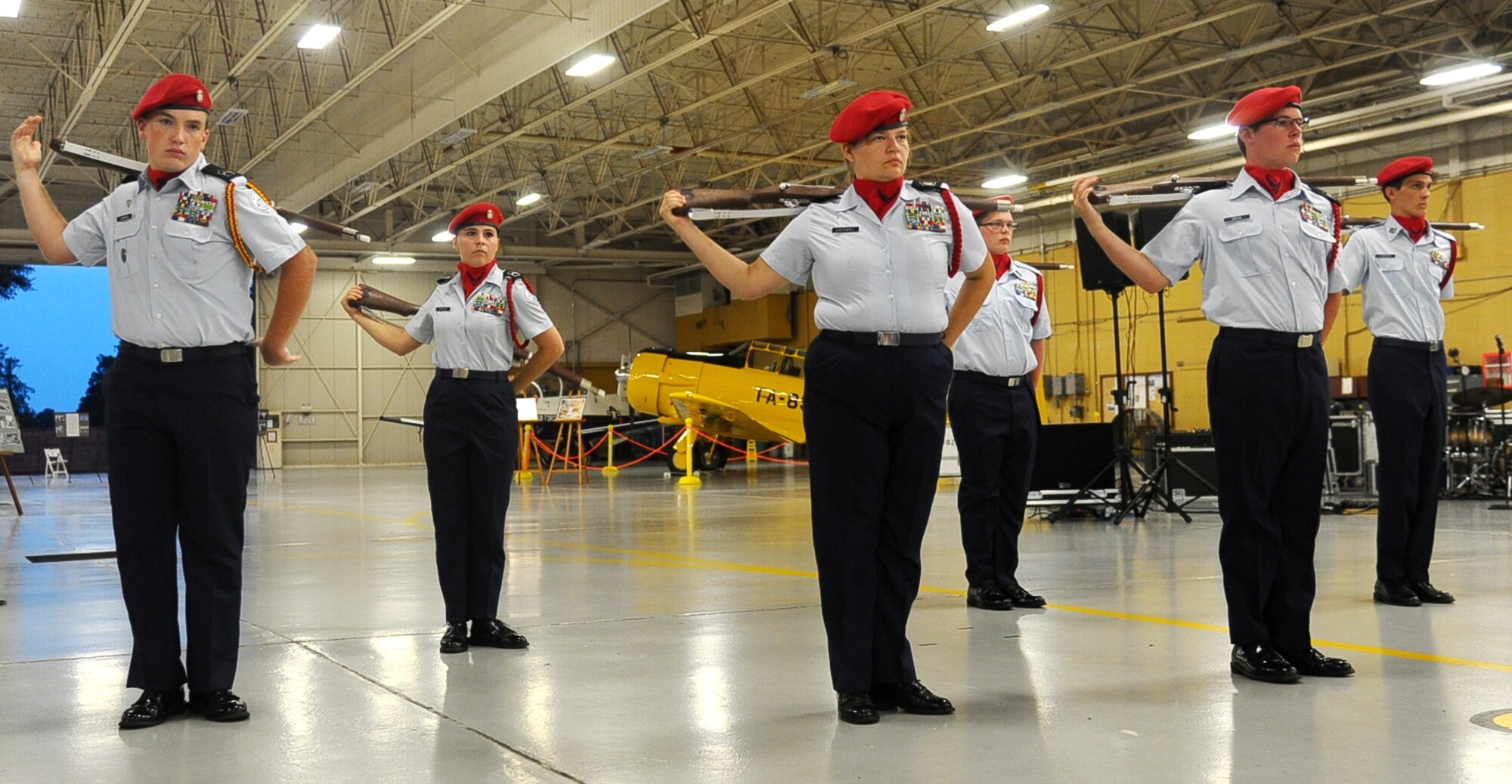 A Junior ROTC Saber team performs during the Air Force Ball Sept. 5 at the Mallory Hangar on Columbus Air Force Base. The cadets spun rifles while marching and saluting during their performance. (U.S. Air Force photo/Airman Daniel Lile)