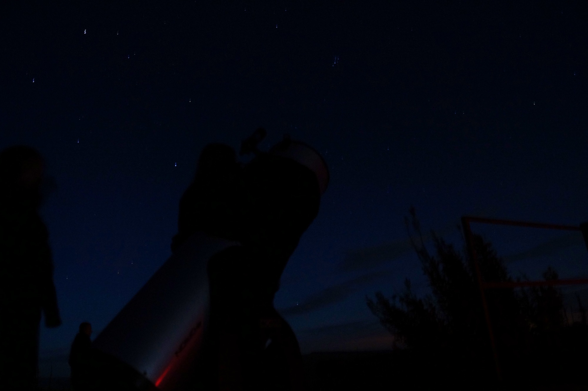 Visitors at the Kielder Observatory take in the night sky through a telescope, Sept. 7, 2014. The observatory is located in England’s only International Dark Sky park and offers a variety of events, classes and workshops open to the public. (U.S. Air Force photo by Tech. Sgt. Eric Burks/Released)