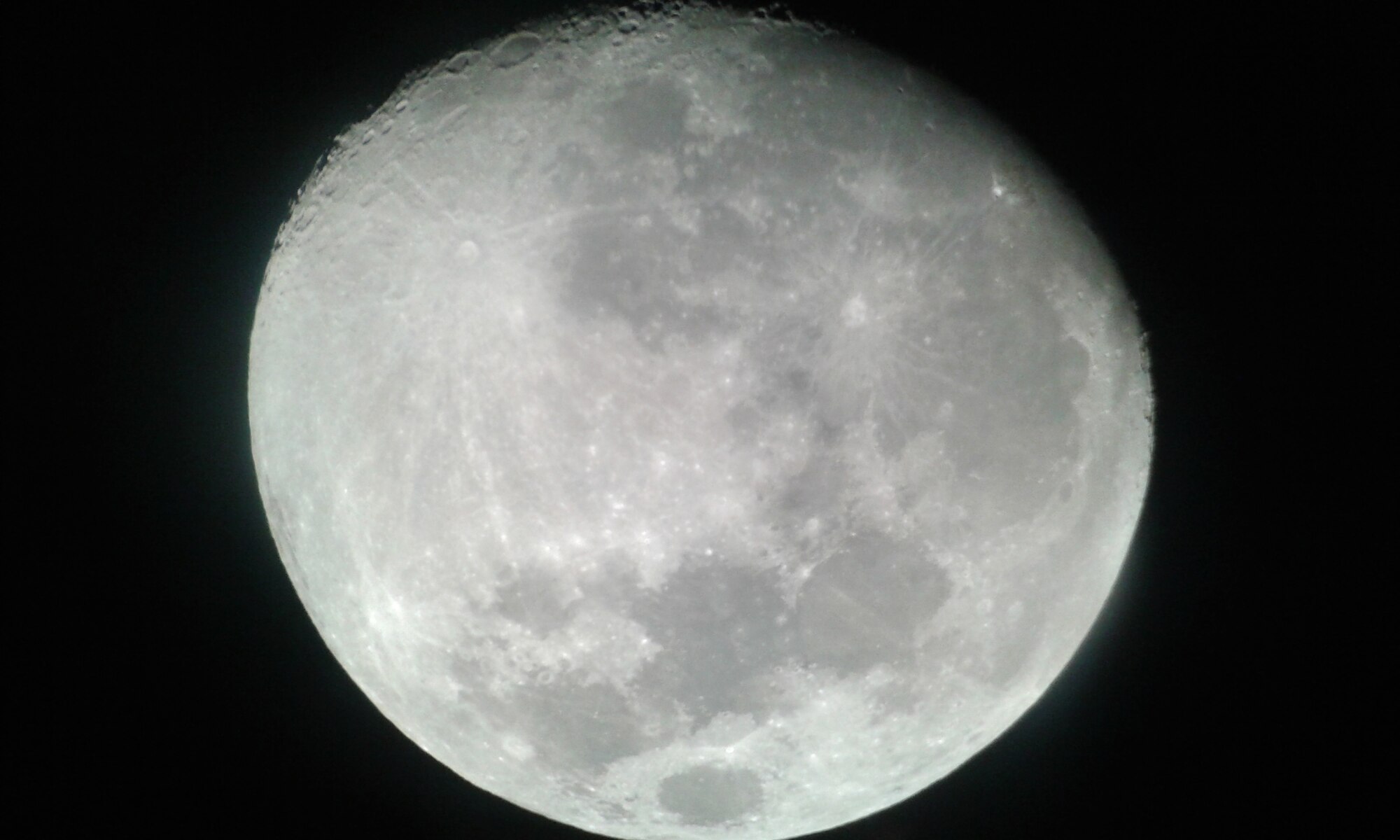 The moon, as viewed through a telescope at the Kielder Observatory. This image was captured with a cell phone camera during an astro photography workshop, Sept. 7, 2014. (Courtesy photo)