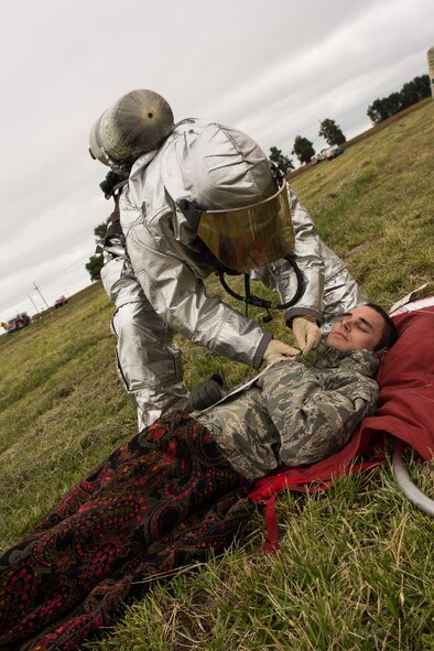 U.S. Airmen Assigned to the 139th Airlift Wing, Missouri Air National Guard, participates in a Major Accident Response Exercise (MARE) on September 11, 2014 at Rosecrans Air National Guard Base in Saint Joseph, Mo. The wing participates in MARE exercises and training to stay prepared for a real world emergency.  (U.S. Air National Guard photo by Senior Airman Sheldon Thompson/released)