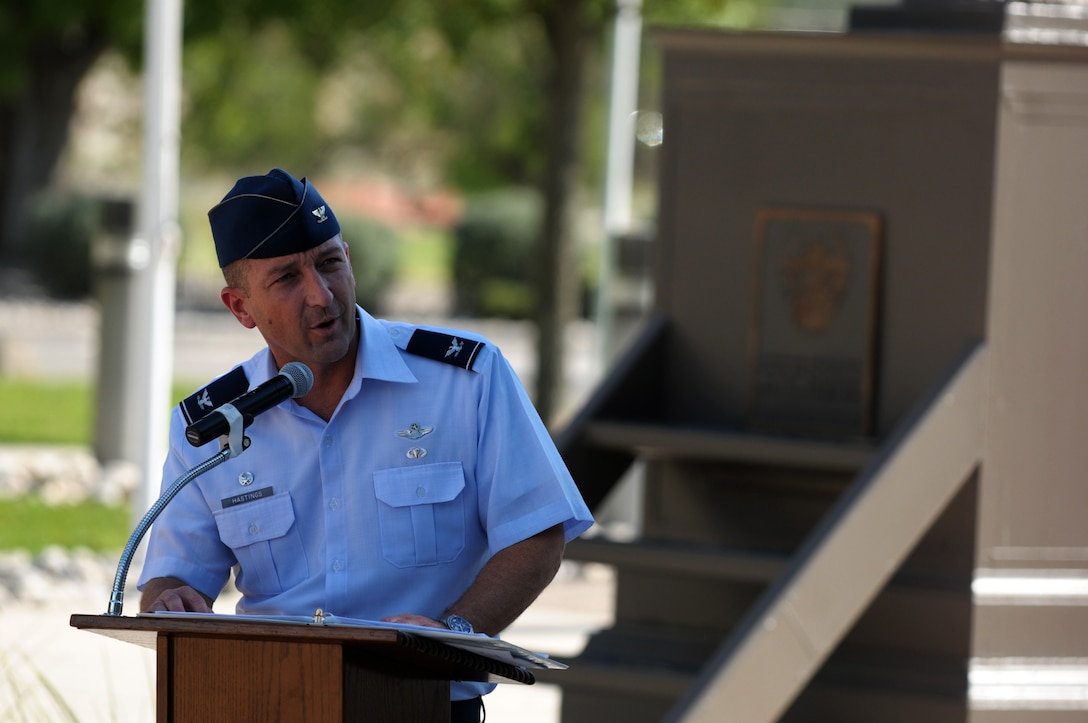 Col. Brian Hastings, 47th Flying Training Wing commander, delivers the keynote speech at a Sept. 11 remembrance retreat ceremony on Laughlin Air Force Base, Texas, Sept. 11, 2014. As moments of silence across the U.S. were being held to mark key moments during the Sept. 11 attacks, Laughlin too recognized the sacrifices of those who were lost and those who found a calling to serve their country. (U.S. Air Force photo by Staff Sgt. Steven R. Doty)(Released)