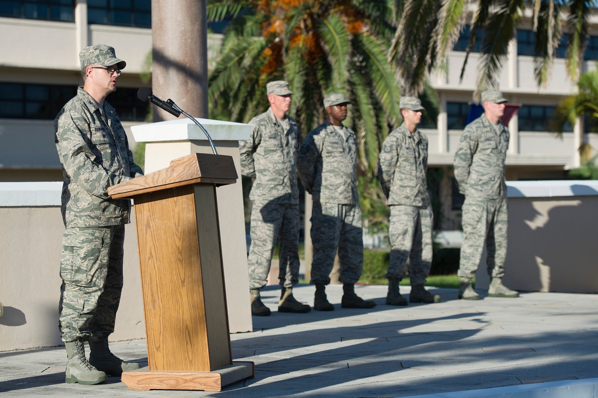 Col. Shawn Fairhurst, 45th Space Wing vice commander, shares his remarks with Team Patrick-Cape during the 9/11 Patriot Day remembrance ceremony at Patrick Air Force Base, Florida, Sept. 11, 2014. Fairhust said that it is the recognition that we are a shining example for the world; and that we understand that Freedom isn't free--it is and won and sustained by Patriots who serve. (U.S. Air Force Photo/Matthew Jurgens) (Released)