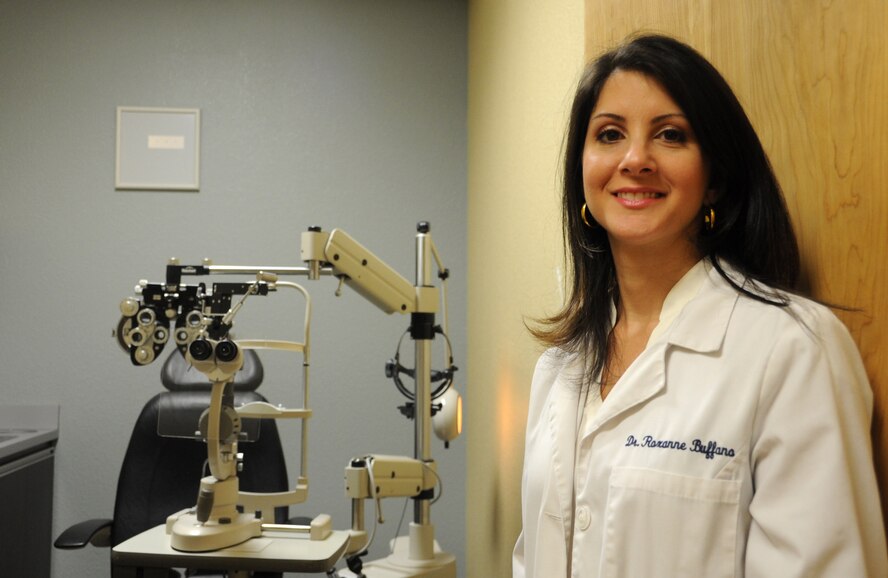 U.S. Air Force Capt. Roxanne Buffano, 927th Aersospace Medicine Squadron optometrist, took time away from her civilian practice to participate in TROPICARE 2014. While deployed she performed approximately 600 eye exams for the under-served population in Kauai, Hawaii. (U.S. Air Force photo/Staff Sgt. Adam Borgman)