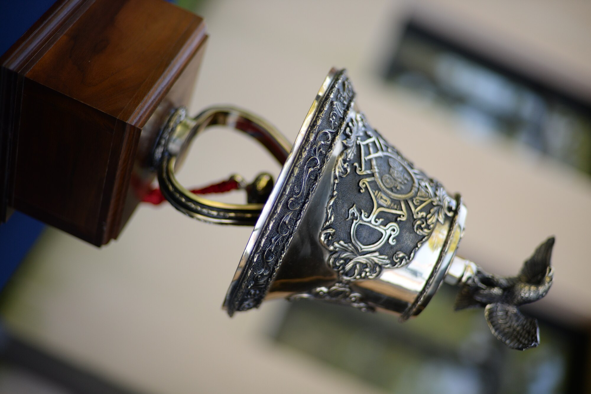 The ceremonious bell sits idly after being rung three times during a 9/11 remembrance ceremony Sept. 11, 2014, Moody Air Force Base, Ga. The ringing of the bell is a firefighter’s tradition to honor other fallen fighters which signifies the call to duty, that duty is complete and that the firefighters have come home. (U.S. Air Force photo by Airman 1st Class Dillian Bamman/Released)