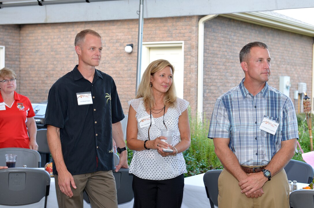 TYNDALL AIR FORCE BASE, Fla. – Col. Derek France left, commander, 325th Fighter Wing and his wife Amanda, center, and his vice commander, Col. Mark O’Laughlin, attend a Fall Festival at the residence of Lt. Gen. William Etter, commander, Continental U.S. North American Aerospace Defense Command Region -1st Air Force (Air Forces Northern). The event brought local civic leaders along with leaders from the 325th FW and AFNORTH together for good food and conversation. (U.S. Photo by Master Sgt. Kurt Skoglund/Released)