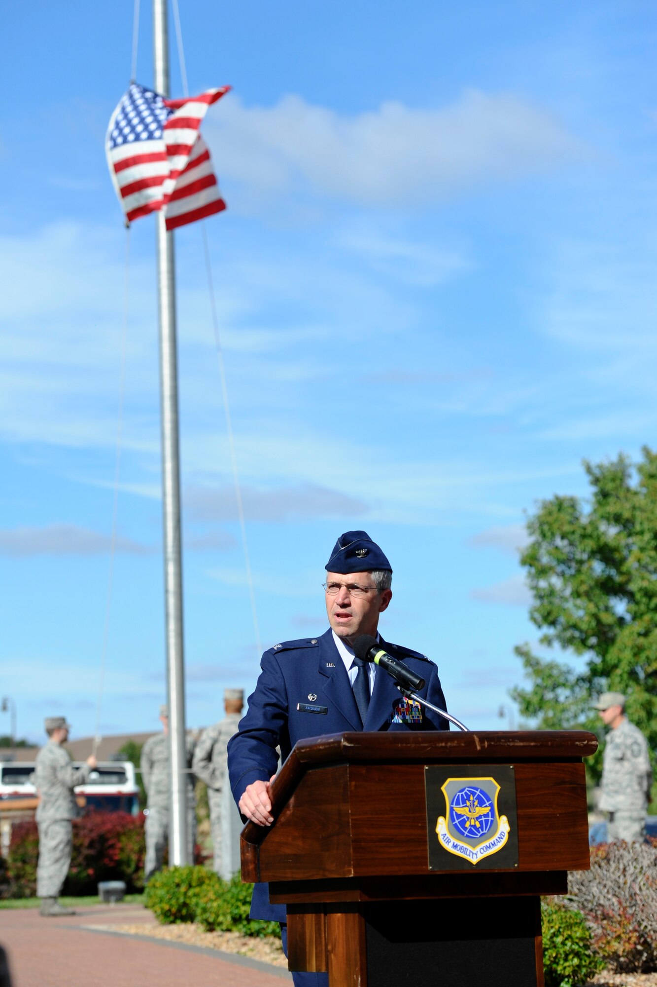 Col. Joel Jackson, 22nd Air Refueling Wing commander, addresses an audience during a Patriot Day ceremony Sept. 11, 2014, at McConnell Air Force Base, Kan. The ceremony included a moment of silence and other military traditions such as a 21-Gun Salute and a Last Alarm Ceremony. (U.S. Air Force photo/Airman 1st Class John Linzmeier)