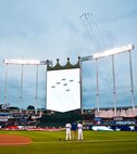 Volunteers from Whiteman Air Force Base participated in the 9/11 memorial flag ceremony at the Kansas City Royals baseball game on Sept. 11, 2014. Airmen participated from the 442 Fighter Wing, 509 Bomb Wing and other units across the base. (Photo by Tech. Sgt. Emily F. Alley, 442FW public affairs)