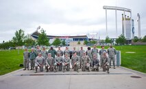 Volunteers from Whiteman Air Force Base participated in the 9/11 memorial flag ceremony at the Kansas City Royals baseball game on Sept. 11, 2014. Airmen participated from the 442 Fighter Wing, 509 Bomb Wing and other units across the base. (Photo by Tech. Sgt. Emily F. Alley, 442FW public affairs)