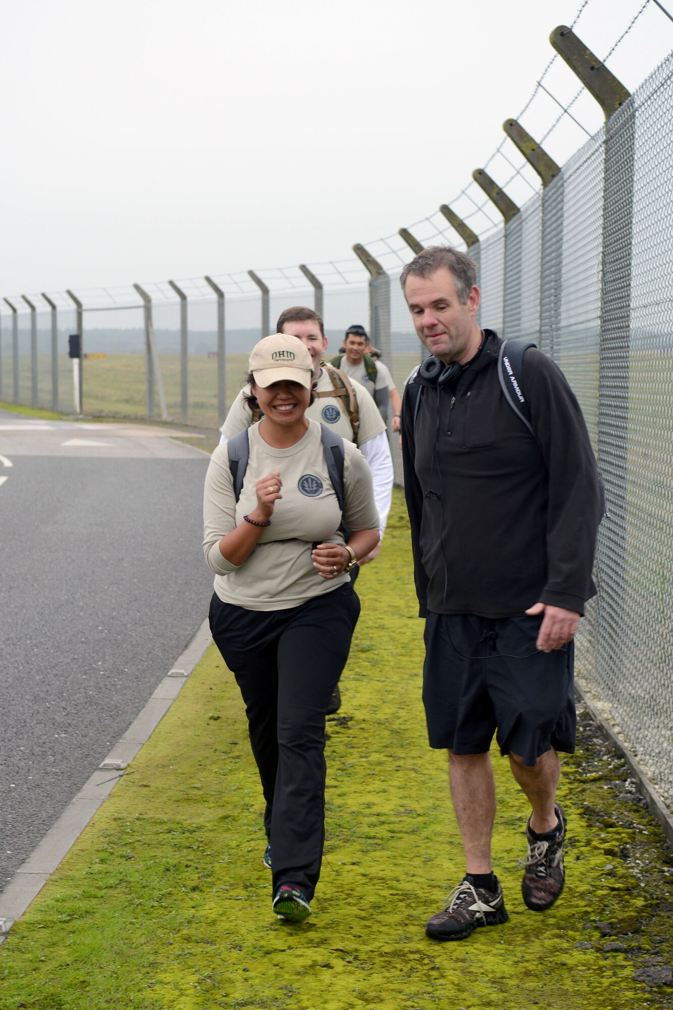 Airmen from the 352nd Special Operations Group participate in a 9/11 Memorial Ruck Sept. 11, 2014, on RAF Mildenhall, England. The participants carried 13 percent of their bodyweight along the base perimeter in honor of the 13 year anniversary of the attacks on Sept. 11, 2001. (U.S. Air Force photo/Airman 1st Class Kyla Gifford/Released)