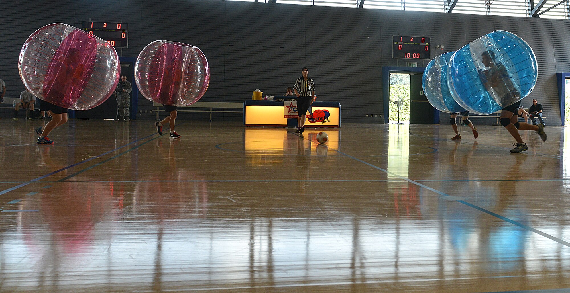 Army and Air Force service members start a bubble soccer game Sept. 5 on Ramstein. The first Combined Federal Campaign, officially called CFC, was started in 1964. It was conducted in six cities and allows federal employees to donate to charities of their choice to better their communities. (U.S. Air Force photo/Senior Airman Holly Mansfield)


