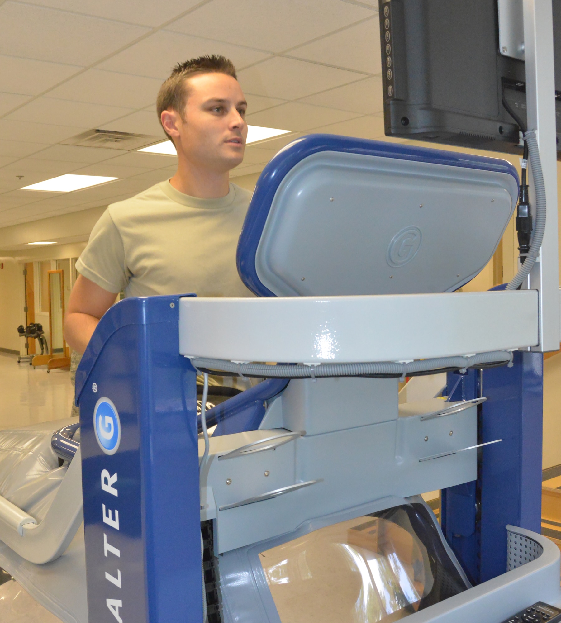 Capt. Brandon Reed, 78th Medical Group Optometry deputy flight commander, gives the Physical Therapy Clinic’s AlterG Anti-Gravity Treadmill a test run Sept. 3. (U.S. Air Force photo by Ed Aspera)