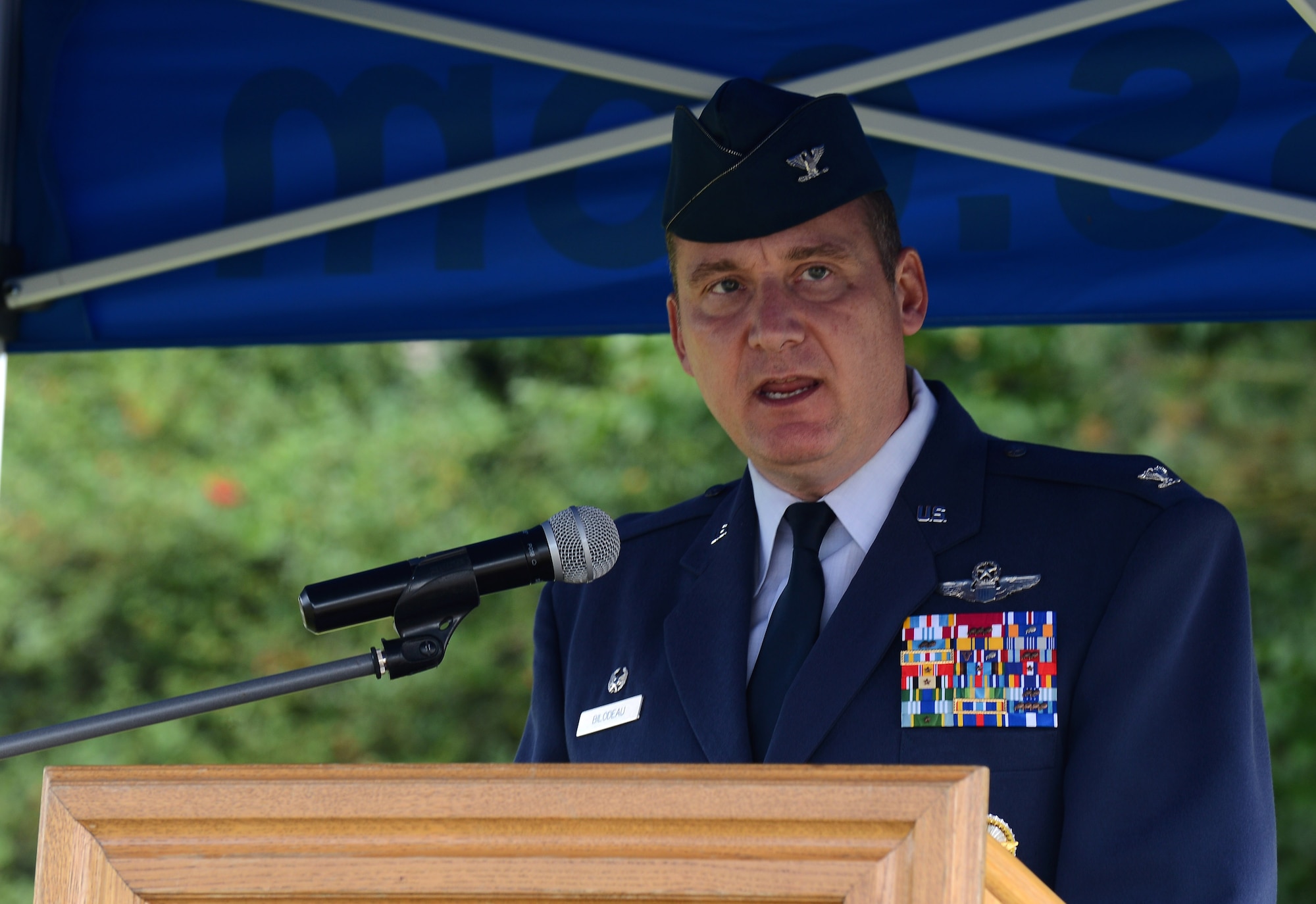U.S. Air Force Col. Pete Bilodeau, 52nd Fighter Wing commander,delivers the opening remarks during a 9/11 ceremony at the Spangdahlem Air Park Memorial Sept. 11, 2014, at Spangdahlem Air Base, Germany. Bilodeau touched on the importance of remembering and honoring those who lost their lives that day 13 years ago. (U.S. Air Force Photo by Airman 1st Class Luke J. Kitterman/Released)