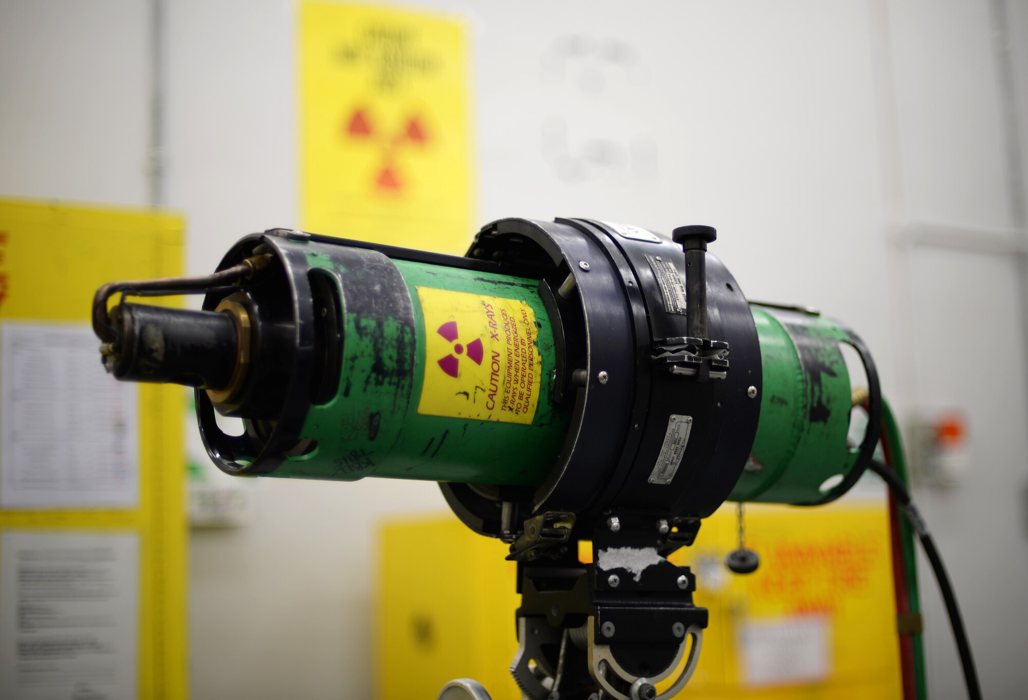 A tube head stands by to produce x-rays to detect any defects found in aircraft components on Royal Air Force Lakenheath, England, Aug. 12, 2014. Nondestructive inspection technicians perform five different types of inspections – x-ray, ultrasonic, eddy current, magnetic particle and penetrant – to detect abnormalities. (U.S. Air Force photo by Staff Sgt. Emerson Nuñez/Released)