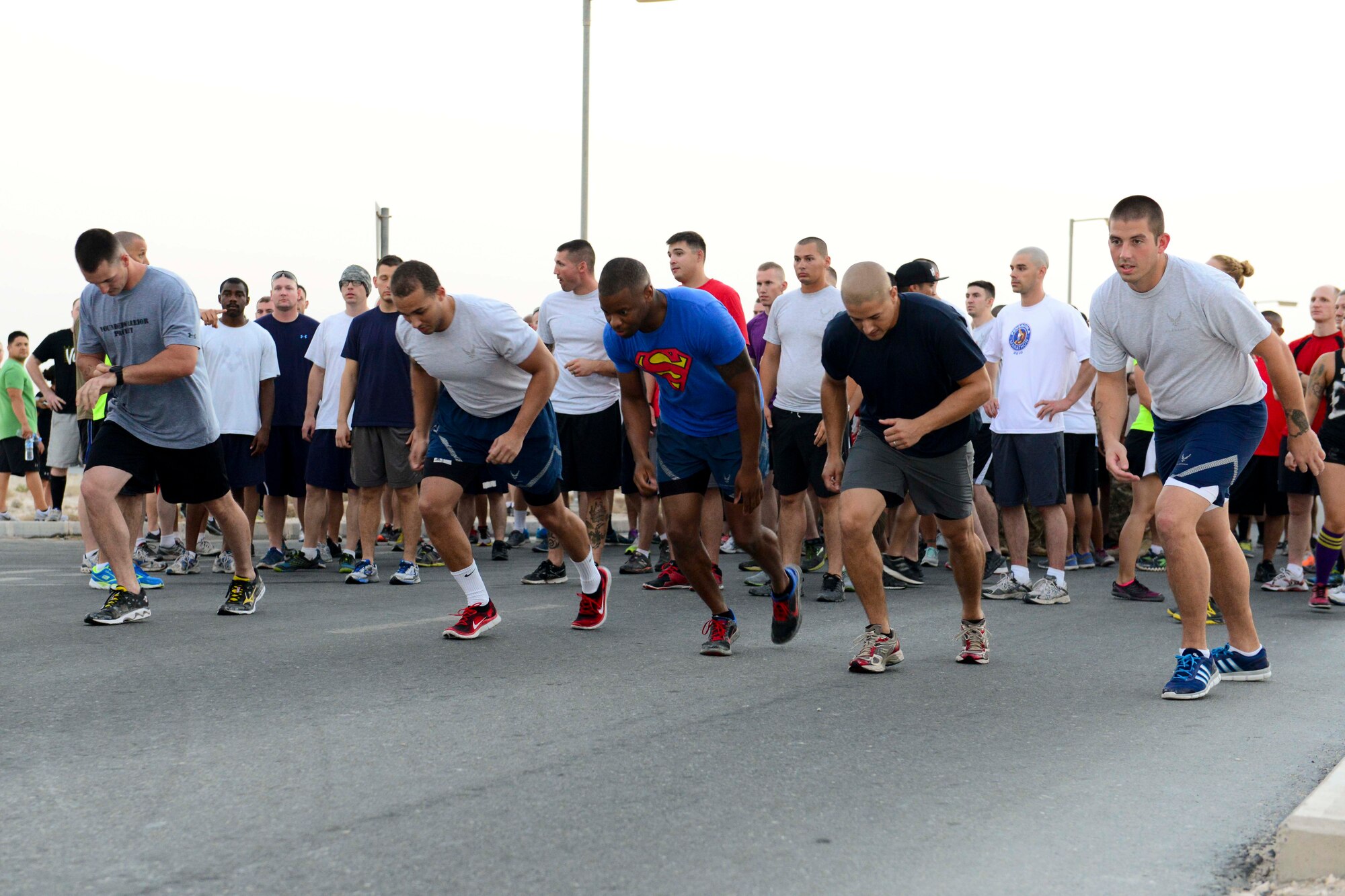 Service members take off to begin a Combined Federal Campaign event at Al Udeid Air Base, Qatar, Sept. 8, 2014. In 2013, the campaign raised $10.9 million in donations received from military and civilian personnel. (U.S. Air Force photo by Staff Sgt. Ciara Wymbs)