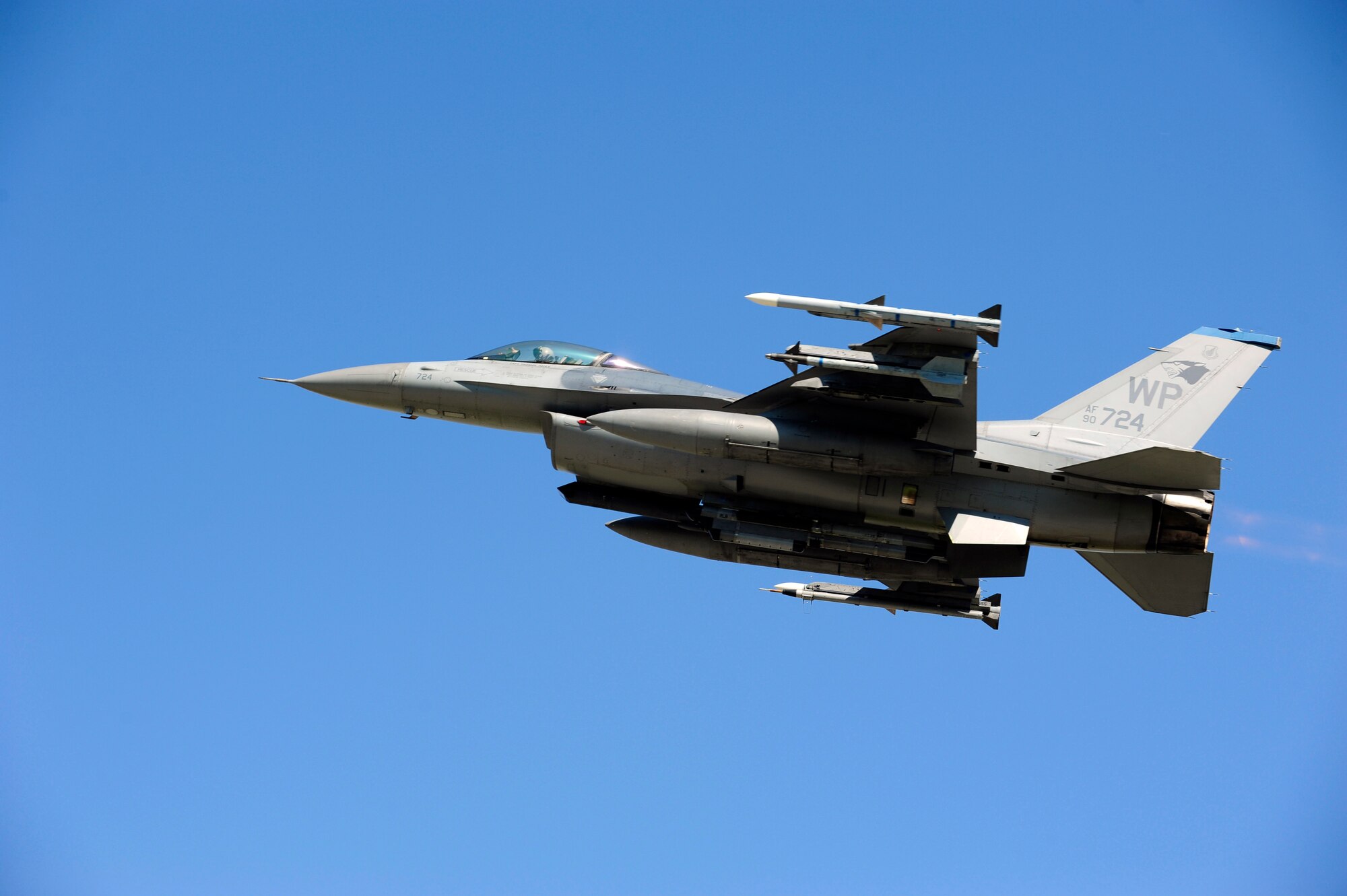 An F-16 Fighting Falcon departs from Kunsan Air Base, Sept. 10, 2014. The F-16 is being flown to Osan AB to temporarily operate flying missions while the runway at Kunsan is under construction for repairs. (U.S. Air Force photo by Senior Airman Taylor Curry/Released)
