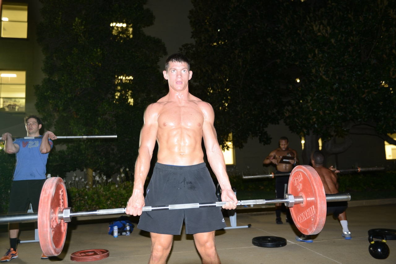 Army Staff Sgt. River Mitchell participates in an intense physical training workout at the Pentagon, Sept. 11, 2014, held to commemorate the 13th anniversary of 9/11. Mitchell, vice president of the Military District of Washington’s Sergeant Audie Murphy Club, said sponsorship of the 9/11 Tribute WOD is another way to spread the word about the club. U.S. Army photo by C. Todd Lopez