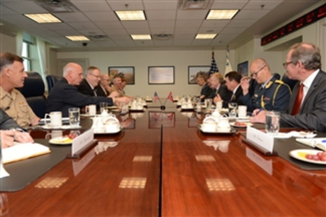 U.S. Deputy Defense Secretary Bob Work, third from left, meets with Norwegian State Secretary for Defense Oystein Bo, third from right, at the Pentagon, Sept. 12, 2014. The two defense leaders met to discuss issues of mutual importance.