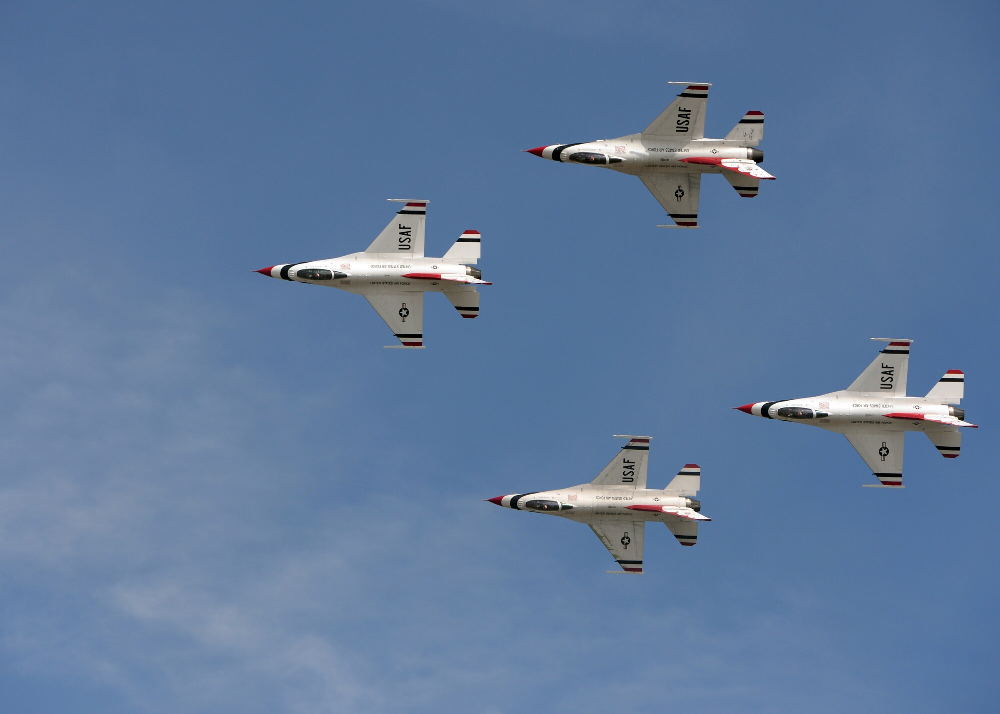 ALTUS AIR FORCE BASE, Okla. – U.S. Air Force Thunderbirds perform a diamond roll during the 2014 Wings of Freedom Open House, Sept. 12, 2014. The open house allowed the public to view several Air Force aircraft and helicopters, watch civilian aerial demonstrations and experience aerial performances from the Air Force Thunderbirds and the U.S. Air Force Academy Wings of Blue parachuting team. (U.S. Air Force photo by Senior Airman Franklin R. Ramos/Released)