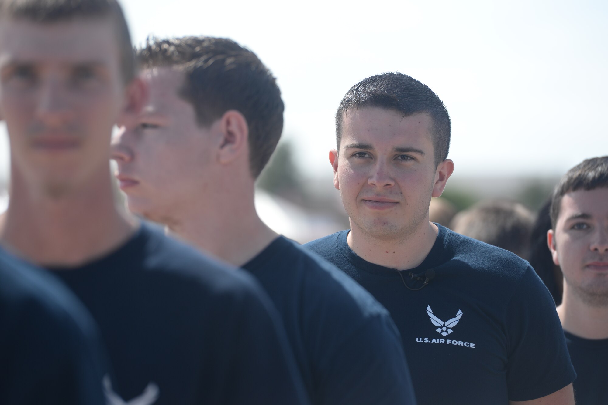ALTUS AIR FORCE BASE, Okla. – Thomas Farley stands in line waiting to be sworn in at the 2014 Wings of Freedom Open House, Sept. 13, 2014. Thomas and more than 20 other high school graduates began their career in the Air Force by being sworn in by the U.S. Air Force Thunderbirds. (U.S. Air Force photo by Senior Airman Levin Boland/Released)