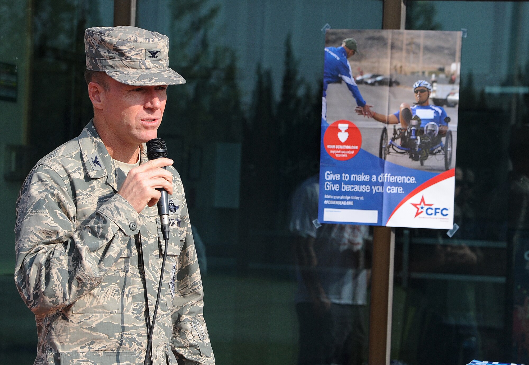 Col. Ken "Wolf" Ekman, 8th Fighter Wing commander, talks to Wolf Pack Airmen about  Combined Federal Campaign-Overseas opportunities before the CFC-O kickoff events at Kunsan Air Base, Republic of Korea, Sept. 13, 2014.  Airmen came together on a Saturday morning  to support CFC-O by participating in an ultimate frisbee and bowling tournament. (U.S. Air Force photo by Senior Airmen Divine Cox)
