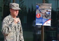 Col. Ken "Wolf" Ekman, 8th Fighter Wing commander, talks to Wolf Pack Airmen about  Combined Federal Campaign-Overseas opportunities before the CFC-O kickoff events at Kunsan Air Base, Republic of Korea, Sept. 13, 2014.  Airmen came together on a Saturday morning  to support CFC-O by participating in an ultimate frisbee and bowling tournament. (U.S. Air Force photo by Senior Airmen Divine Cox)