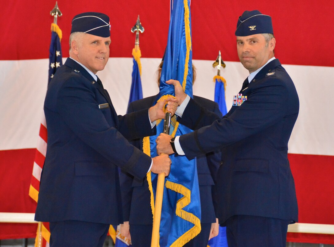Col. Karl Goerke takes command of the 932nd Airlift Wing from Brig. Gen. John Flournoy, Commander of the Fourth Air Force. Prior to taking his new role, Colonel Goerke was commander of the 932nd Operations Group.  The 932nd Airlift Wing, an Air Force Reserve flying unit is located at Scott Air Force Base, Ill. The 932nd AW is an Air Force Reserve Command unit that flies the C-40C. The assumption of command took place on Sept 14, 2014, inside Hangar One, Scott Air Force Base. (U.S. Air Force Photo/ Staff Sgt. Amber Hodges)