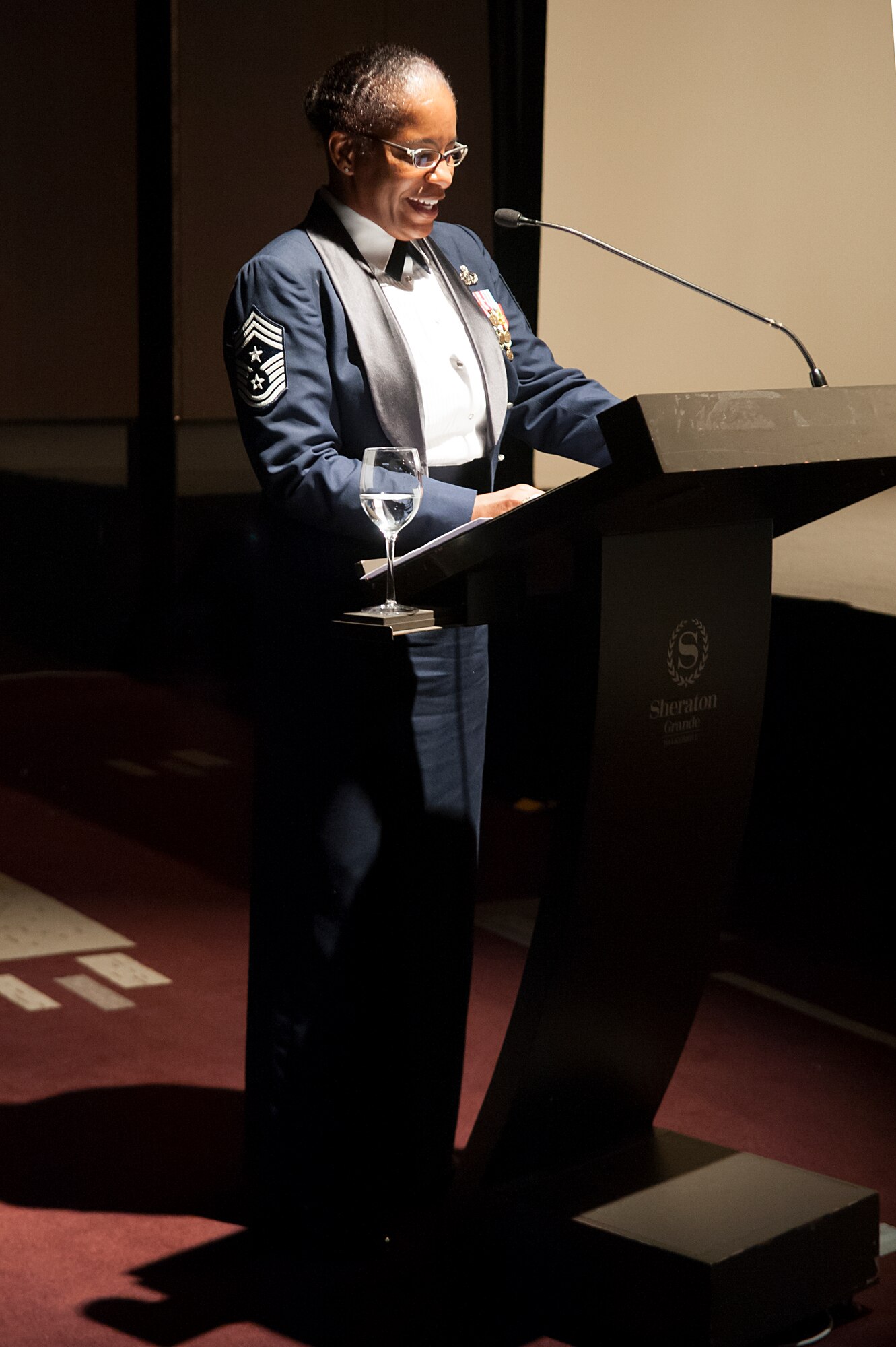 Chief Master Sgt. Shelina Frey, 7th Air Force command chief, gives a speech during the 67th Air Force Ball in Seoul, Republic of Korea, Sept. 13, 2014. The Air Force ball celebrates the history and traditions of the Air Force. (U.S. Air Force photo by Senior Airman Matthew Lancaster)