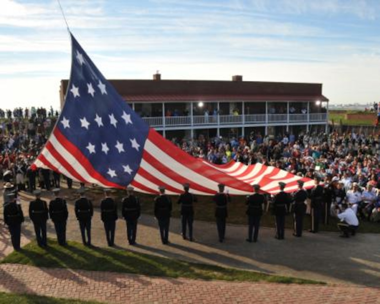 A replica of the original Star-Spangled Banner is hoisted during the Dawn’s Early Light Ceremony at Fort McHenry in Baltimore, Sept. 14, 2014. The ceremony commemorates the date and time 200 years ago that Francis Scott Key was inspired to write the words that would become the national anthem. U.S. Coast Guard photo by Petty Officer 1st Class Pamela J. Boehland