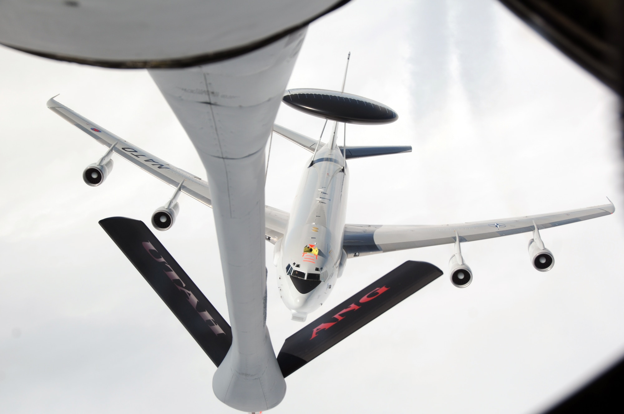 A NATO E-3A Sentry (AWACS) approaches a Utah Air National Guard KC-135R Stratotanker for air refueling during a training exercise May 2014, over Germany. (Utah Air National Guard photo/Staff Sgt. Annie Edwards)