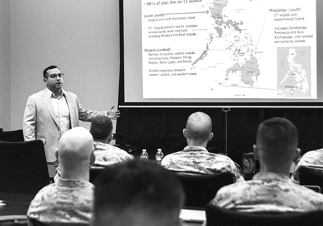 Yale M. Needel, an Asia-Pacific analyst for the Center for Advanced Operational Culture Learning, instructs Marines soon headed to Asia during a recent class. (Photo courtesy of CAOCL)