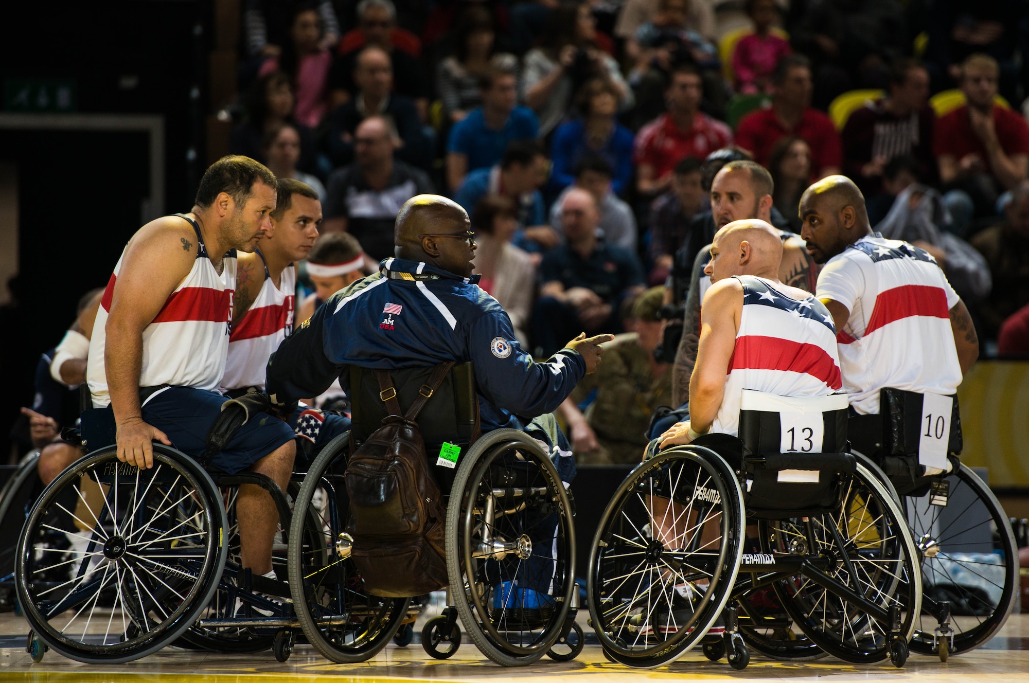 The U.S. fought hard in the wheelchair basketball finals, but fell 19-9 to Great Britain to take silver at the inaugural Invictus Games Sept. 13, in London. The Invictus Games featured athletes competing in various Paralympic-style events, including swimming, track and field, seated volleyball, wheelchair basketball, and wheelchair rugby, among others. (Courtesy photo)
