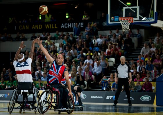 The U.S. fought hard in the wheelchair basketball finals, but fell 19-9 to Great Britain to take silver at the inaugural Invictus Games Sept. 13, in London. The Invictus Games featured athletes competing in various Paralympic-style events, including swimming, track and field, seated volleyball, wheelchair basketball, and wheelchair rugby, among others. (Courtesy photo)
