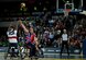 The U.S. fought hard in the wheelchair basketball finals, but fell 19-9 to Great Britain to take silver at the inaugural Invictus Games Sept. 13, in London. The Invictus Games featured athletes competing in various Paralympic-style events, including swimming, track and field, seated volleyball, wheelchair basketball, and wheelchair rugby, among others. (Courtesy photo)