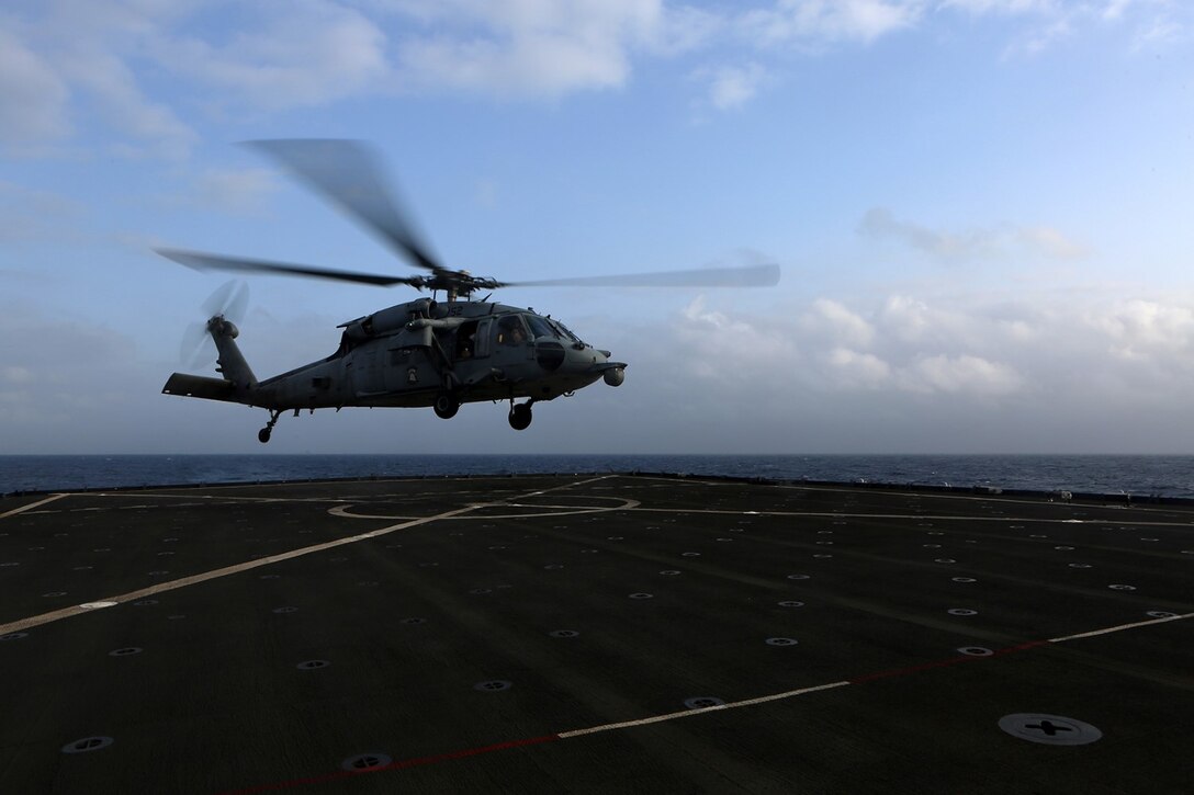 An MH-60S Sea Hawk takes off from the flight deck of the USS Comstock (LSD 45),Sept. 13. The Comstock is part of the Makin Island Amphibious Ready Group and, with the embarked 11th Marine Expeditionary Unit, is deployed in support of maritime and theater security operations in the U.S. 5th Fleet area of responsibility. (U.S. Marine Corps photo by Sgt. Melissa Wenger/ Released)