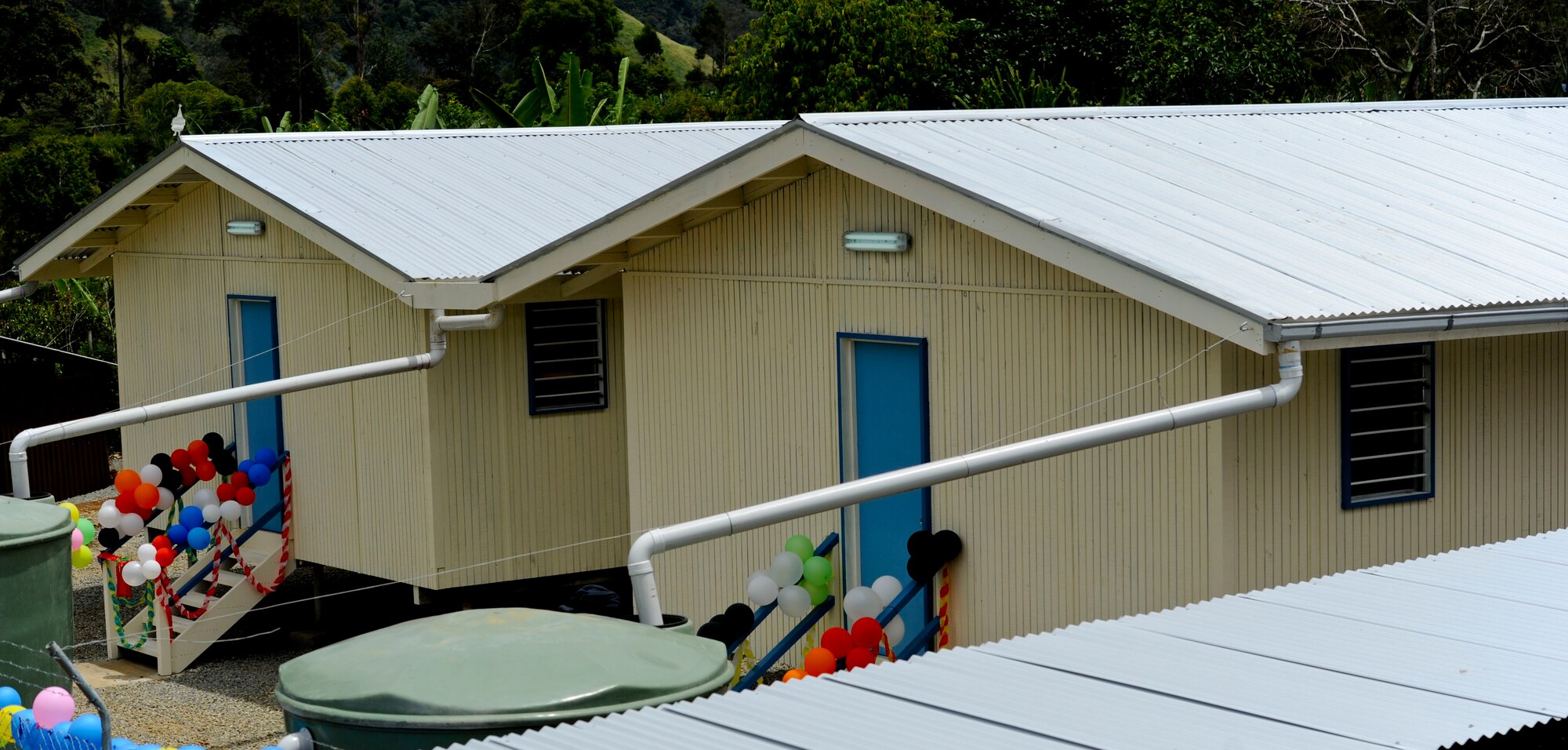 Construction for Pacific Unity 14-8 began in Mount Hagen, Papua New Guinea, in August 2014. For the operation, members of the Hawaii Air National Guard’s 154th Wing Civil Engineer Squadron constructed two new dormitories to be used for female students at Togoba Secondary School. PACUNITY helps cultivate common bonds and fosters goodwill between the U.S. and regional nations through multi-lateral humanitarian assistance and civil military operations.  (U.S. Air Force photo by Tech. Sgt. Terri Paden/Released)                               