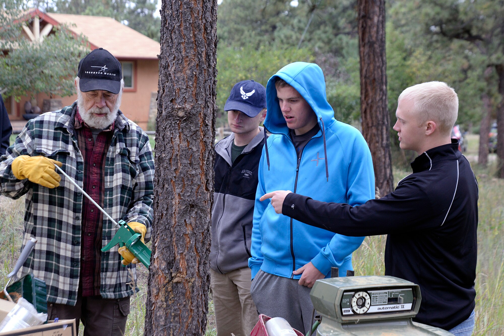 About 60 cadets rallied around Woodland Park in the Ranch Estates community to cut trees in the urban-woodland interface and provide firewood for needy homes Sept. 13. (U.S. Air Force photo/Mike Kaplan)