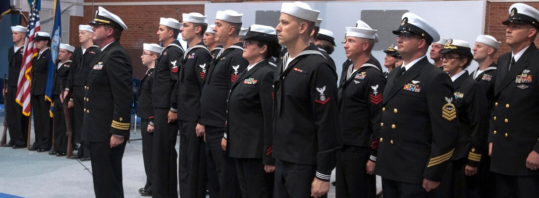 The Naval Operational Support Center hosted a change-of-command ceremony Sept. 13 in the Fall Hall Community Center. Navy Lt. Cmdr. Chad Tidwell relinquished command to Navy Lt. Ryan Clapper. (U.S. Air Force photo by Airman Malcolm Mayfield)