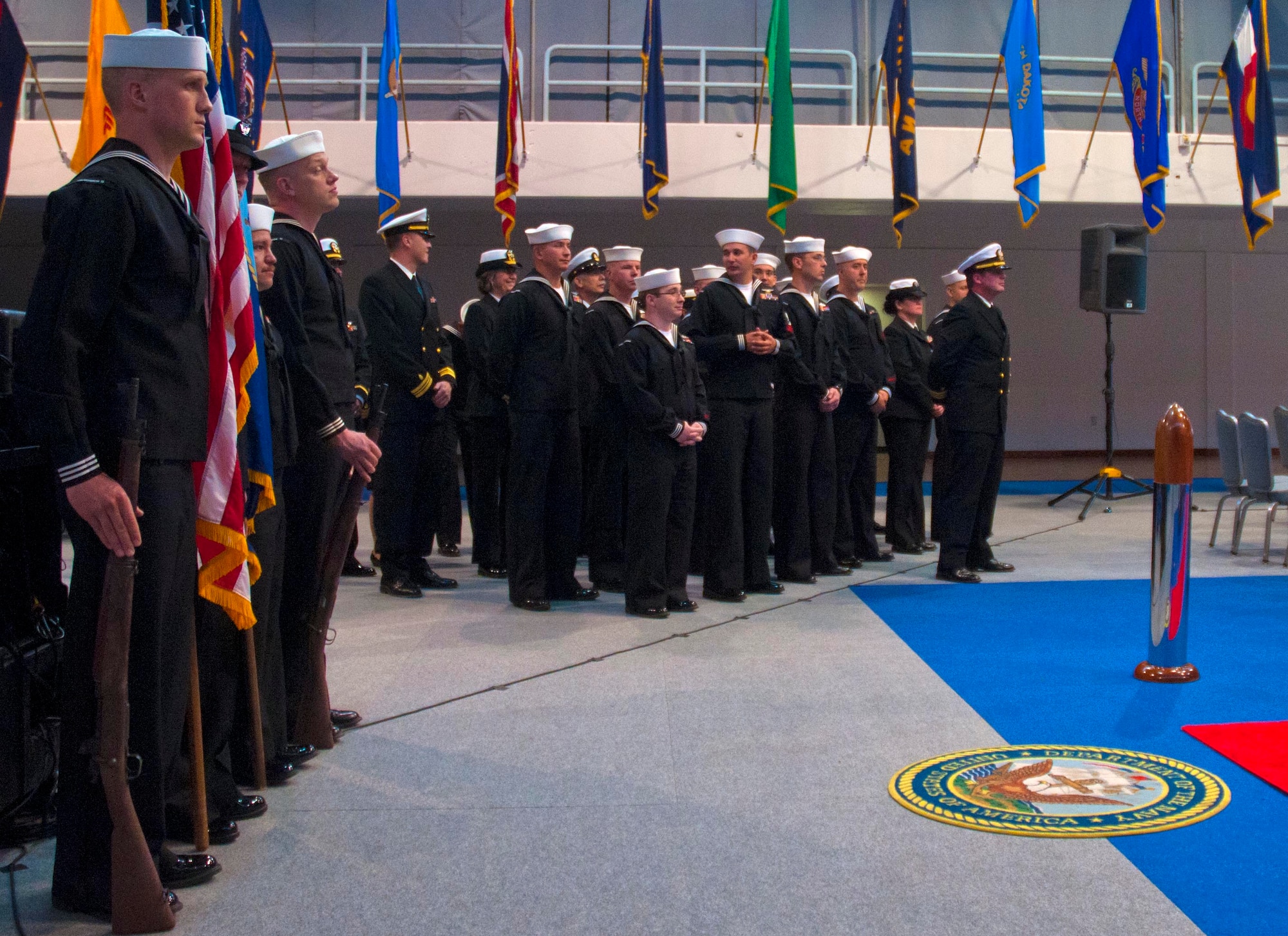 The Naval Operational Support Center hosted a change-of-command ceremony Sept. 13 in the Fall Hall Community Center. Navy Lt. Cmdr. Chad Tidwell relinquished command to Navy Lt. Ryan Clapper. (U.S. Air Force photo by Airman Malcolm Mayfield)