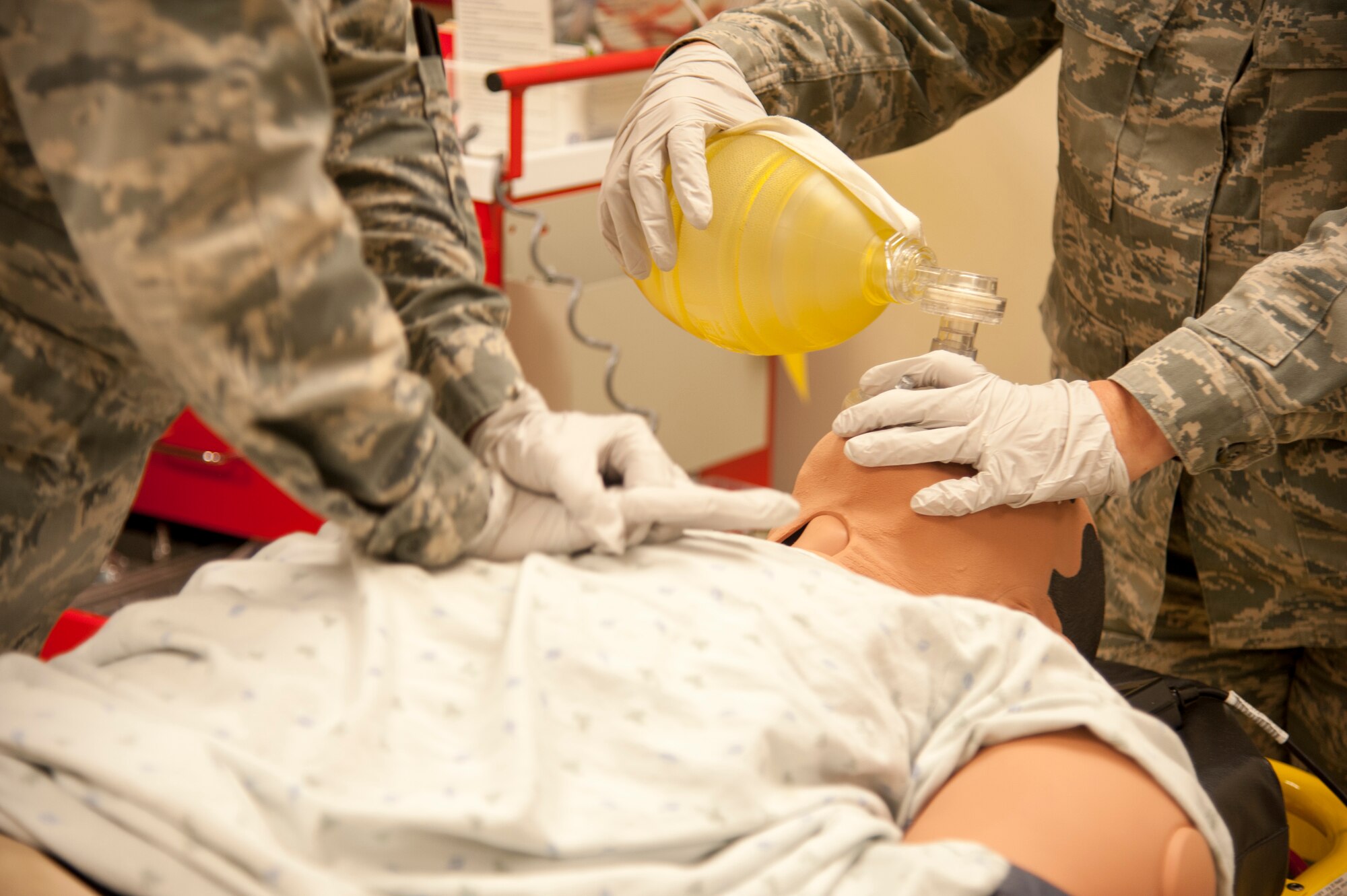 Airmen assigned to Langley train METIman a human patient simulator that can be programmed to replicate trauma and appropriately respond to treatment by the student. (U.S. Air Force photo by Staff Sgt. Candice Page/Released)