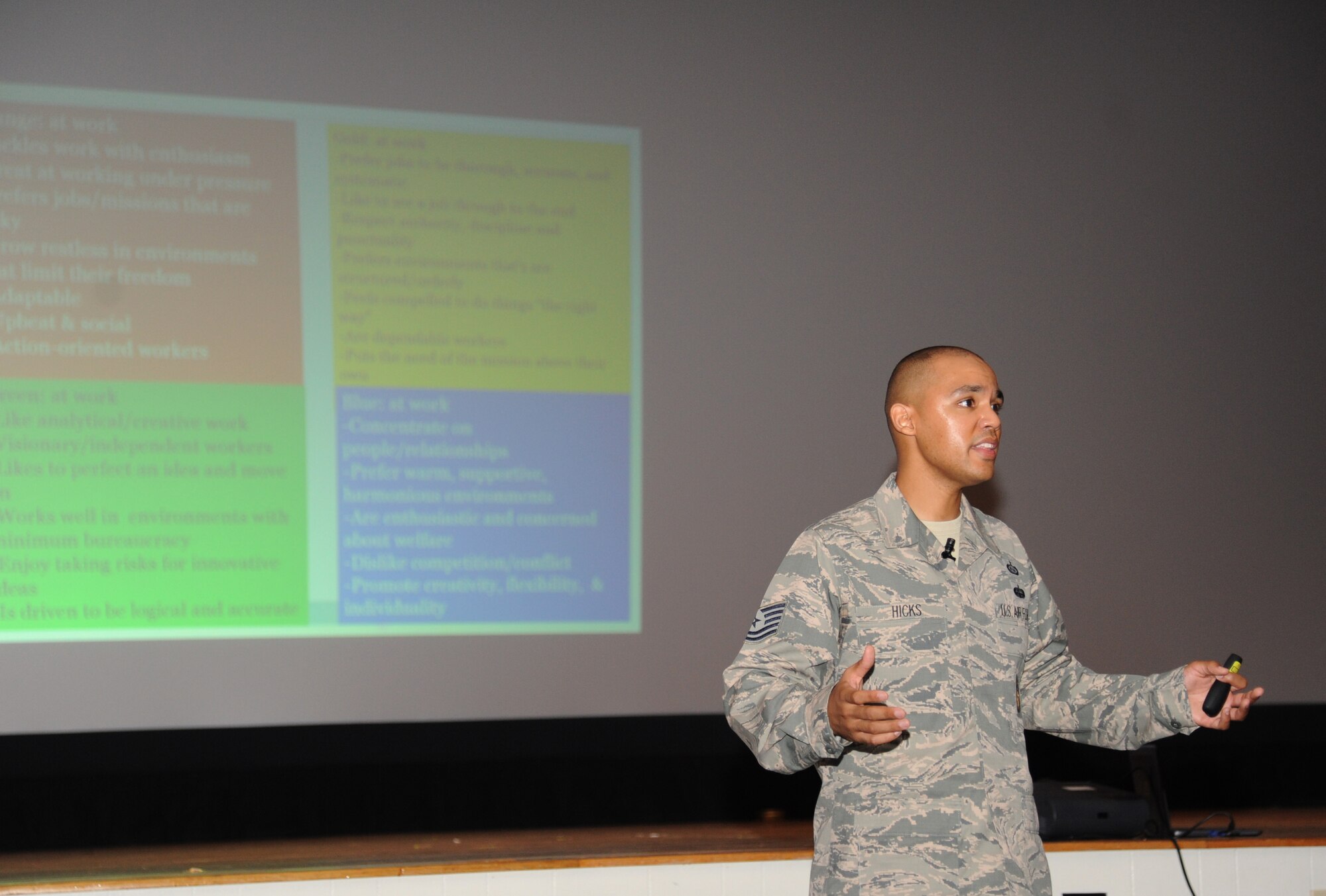 Tech. Sgt. Jewell Hicks, inspector/operations, Lackland Air Force Base, Texas, delivers a presentation to Keesler Airmen during an Airmen Building Airmen program Sept. 12, 2014, at the Welch Theater, Keesler Air Force Base, Miss.  The goal of the symposium was to create a platform where outstanding Airmen can impart their wisdom to the next generation of Airmen.  The event included other guest speakers and a social mixer. (U.S. Air Force photo by Kemberly Groue)